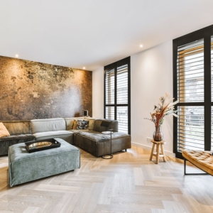 Malermeisterin Kogge - Wohnzimmer mit edler Bronze Wand