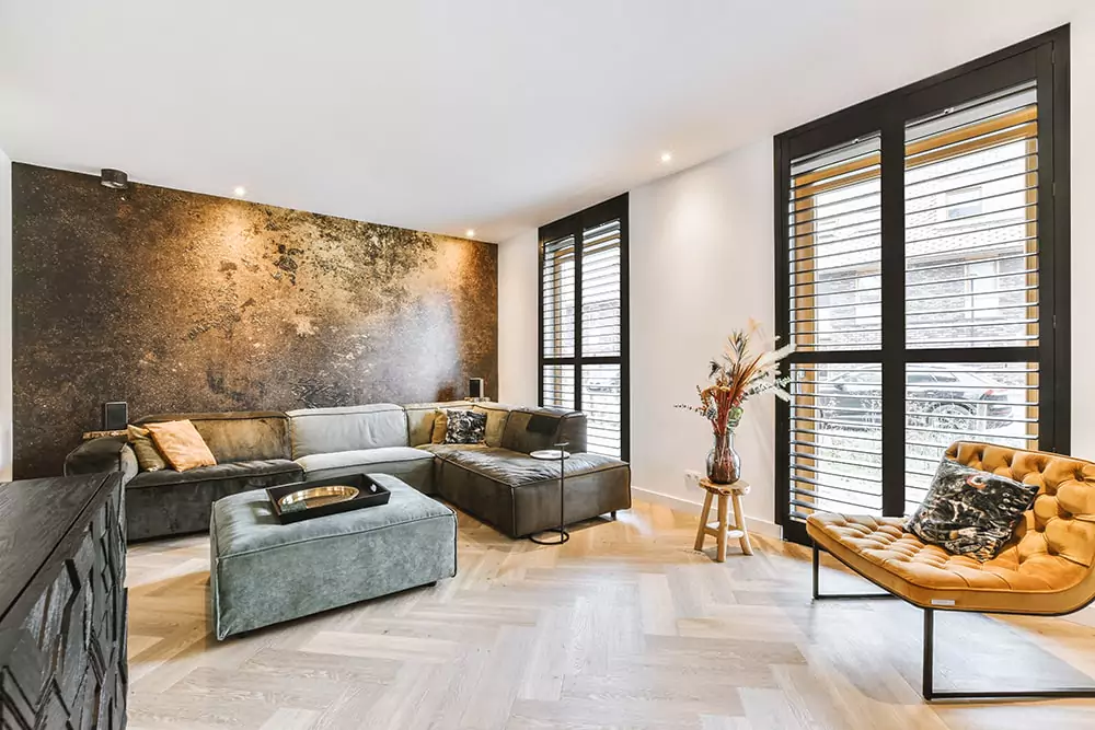 Malermeisterin Kogge - Wohnzimmer mit edler Bronze Wand